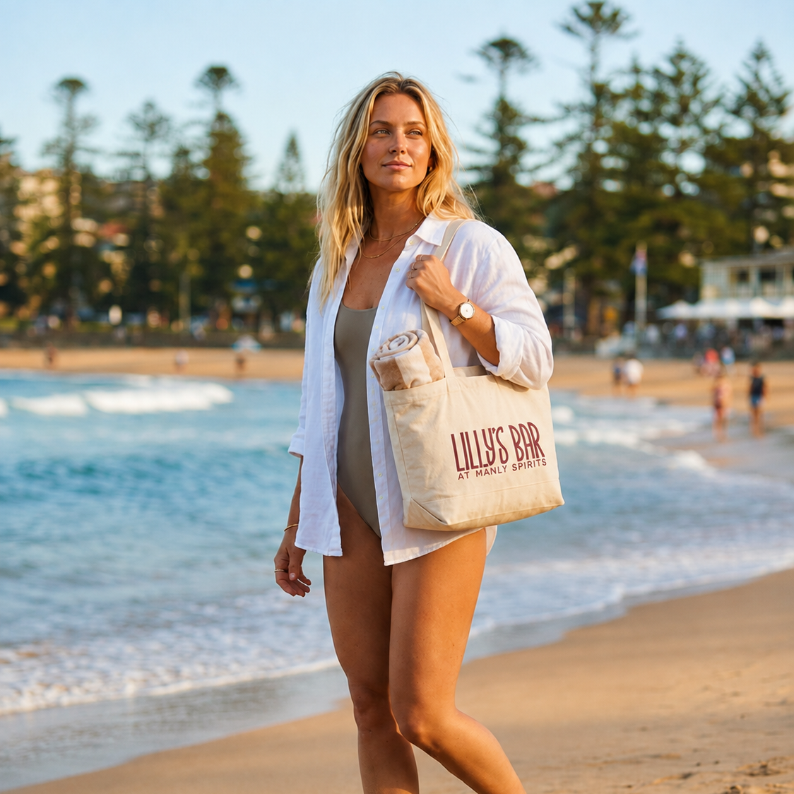 Lilly's Bar at Manly Spirits canvas tote bag carried on the beach