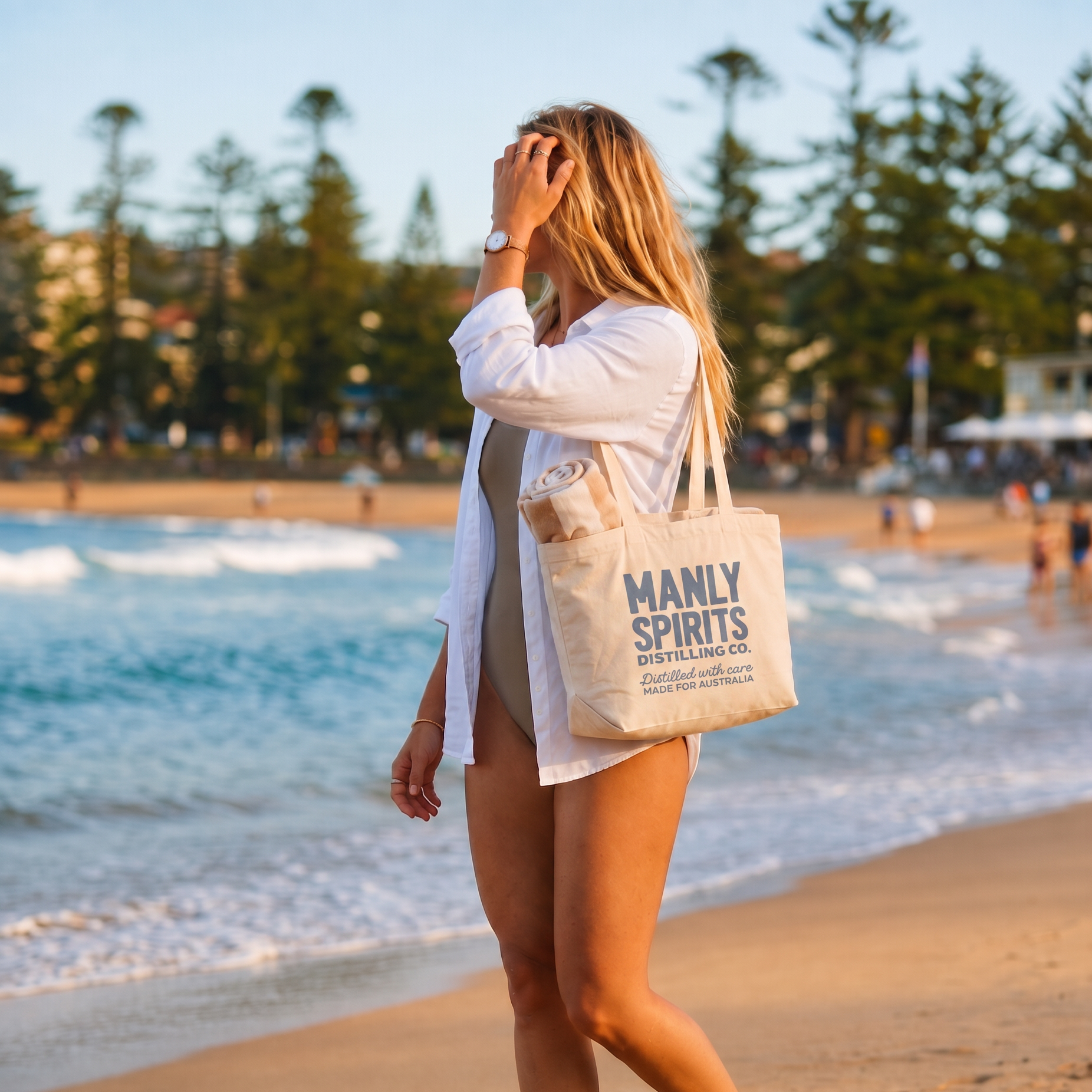 Manly Spirits Distilling Co. canvas tote bag carried on the beach