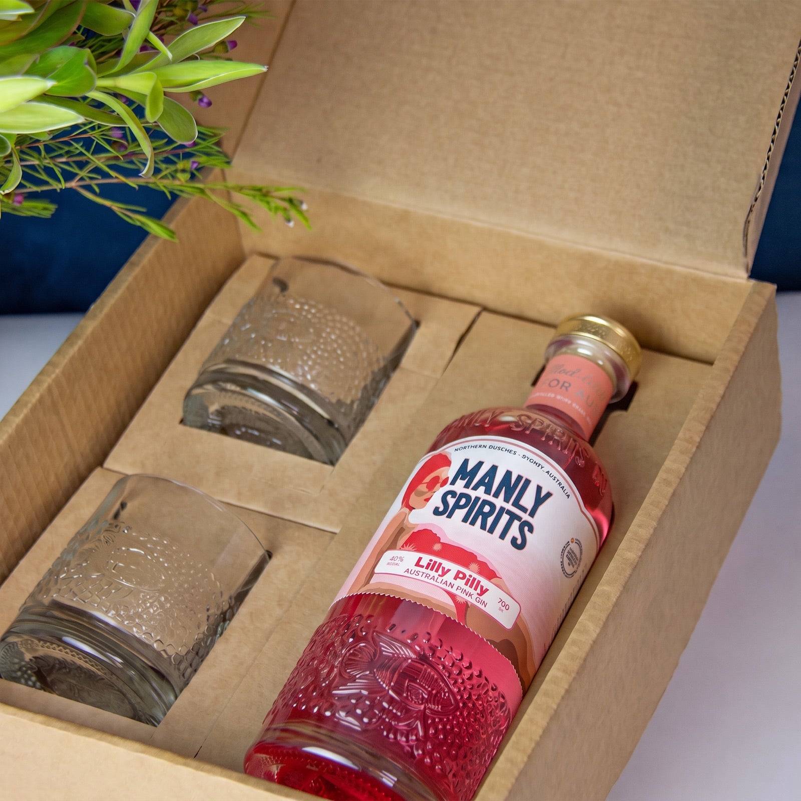 Manly Spirits Lilly Pilly Pink Gin with two upcycled cocktail glasses in a gift box