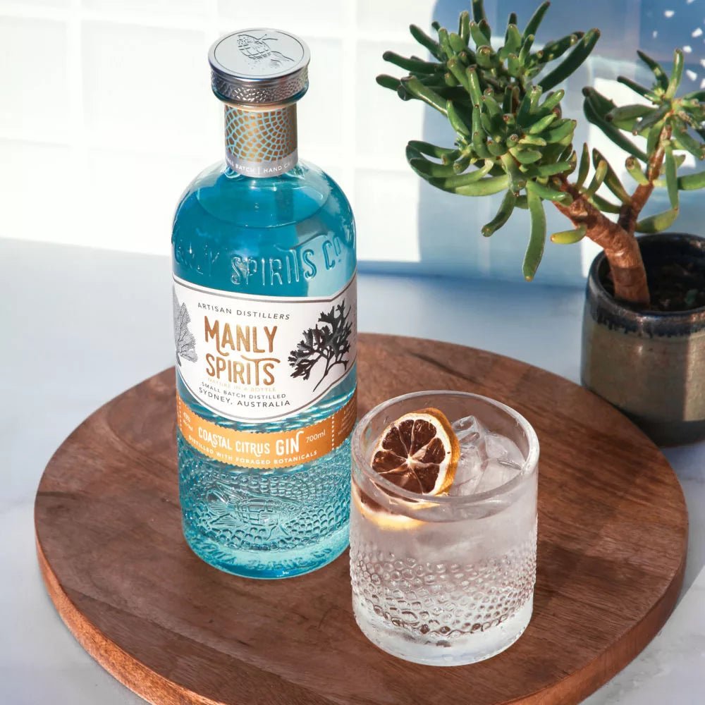 Manly Spirits Gin with a set of 2 of our upcycled glasses. Choose from Australian Dry Gin, Lilly Pilly Pink Gin, Coastal Citrus Gin or Barrel Aged Gin.