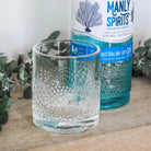 Manly Spirits Gin with a set of 2 of our upcycled glasses. Choose from Australian Dry Gin, Lilly Pilly Pink Gin, Coastal Citrus Gin or Barrel Aged Gin.